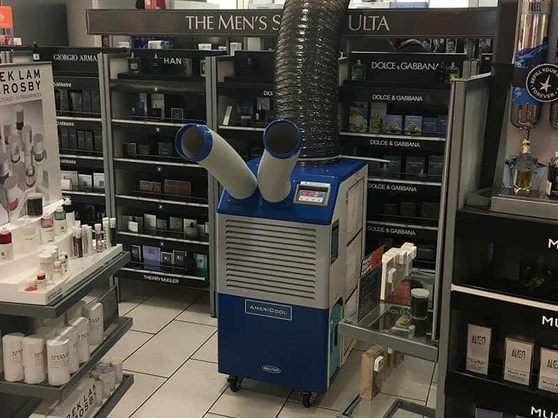 Dehumidifier in retail store for air quality control, surrounded by beauty and skincare products.