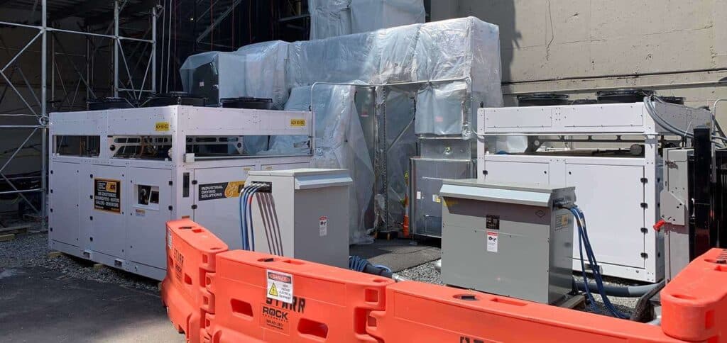 High-voltage industrial electrical equipment on construction site for rental solutions.