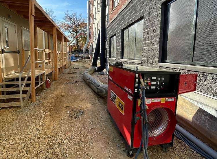 Powerful portable heater for construction site heating and safety monitoring, outdoor work environment, job site utilities.