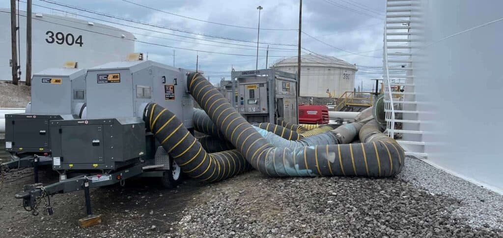 High-capacity industrial cooling units with large flexible ducts for rental use.