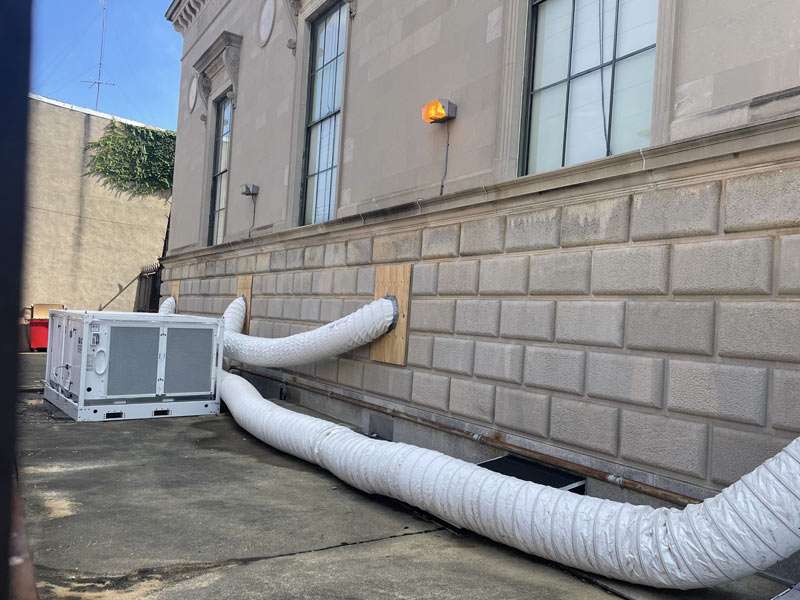 High-capacity HVAC ductwork outside building for efficient climate control and ventilation.