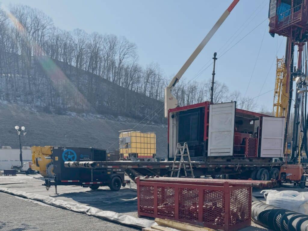 Heavy construction equipment at rental lot for industrial and commercial projects.