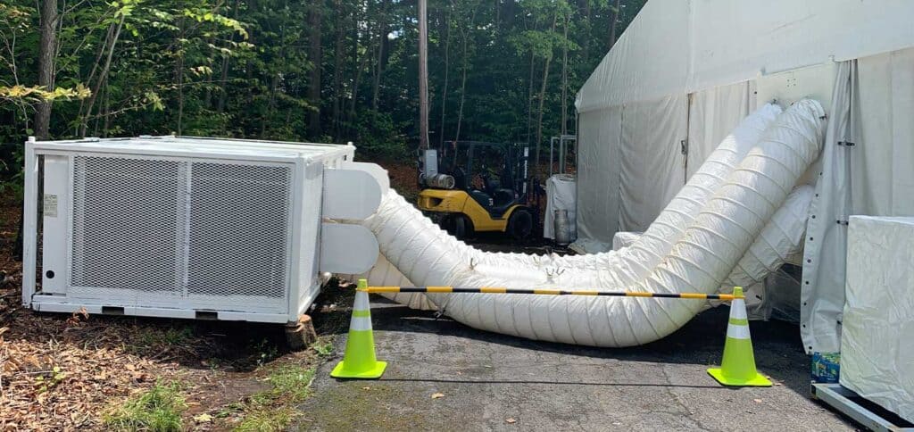 Portable HVAC rental unit with ducting for event tents and temporary cooling solutions.
