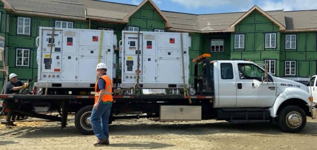 Secure rental property equipment being transported for residential construction.