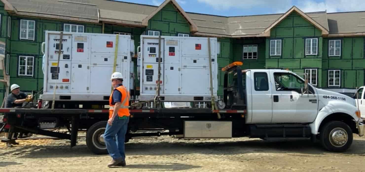 Secure rental property equipment being transported for residential construction.