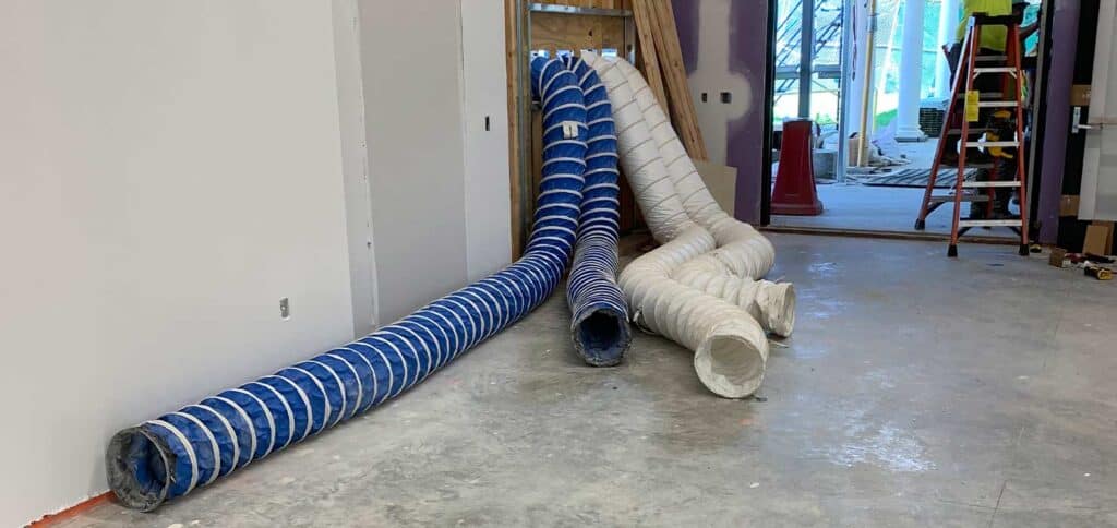 Flexible ductwork installation in a construction or remodeling project.