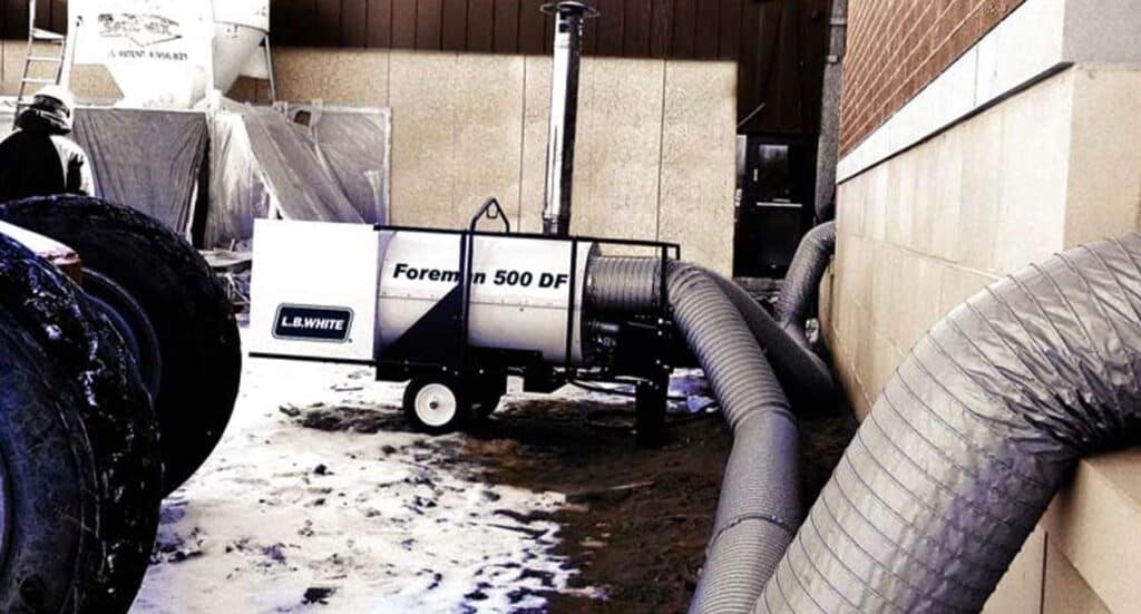 Industrial ducting equipment outside building for heating and ventilation system.