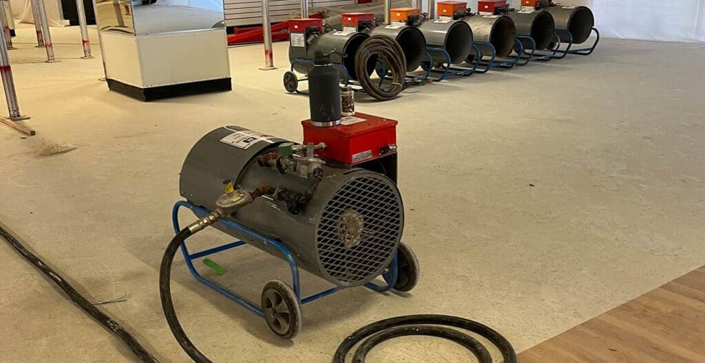 Portable industrial air compressor for construction and rental applications at REIC Specialty Rentals.