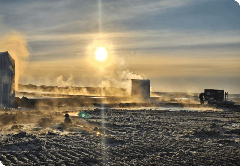 Cold storage facility in icy landscape during sunrise, part of REIC Rentals industrial properties.