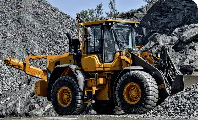 Heavy machinery excavator at construction site for rent, industrial equipment rental services.