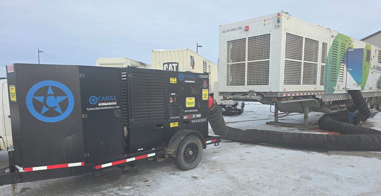 Portable generator providing heat to protect infrastructure during cold weather.