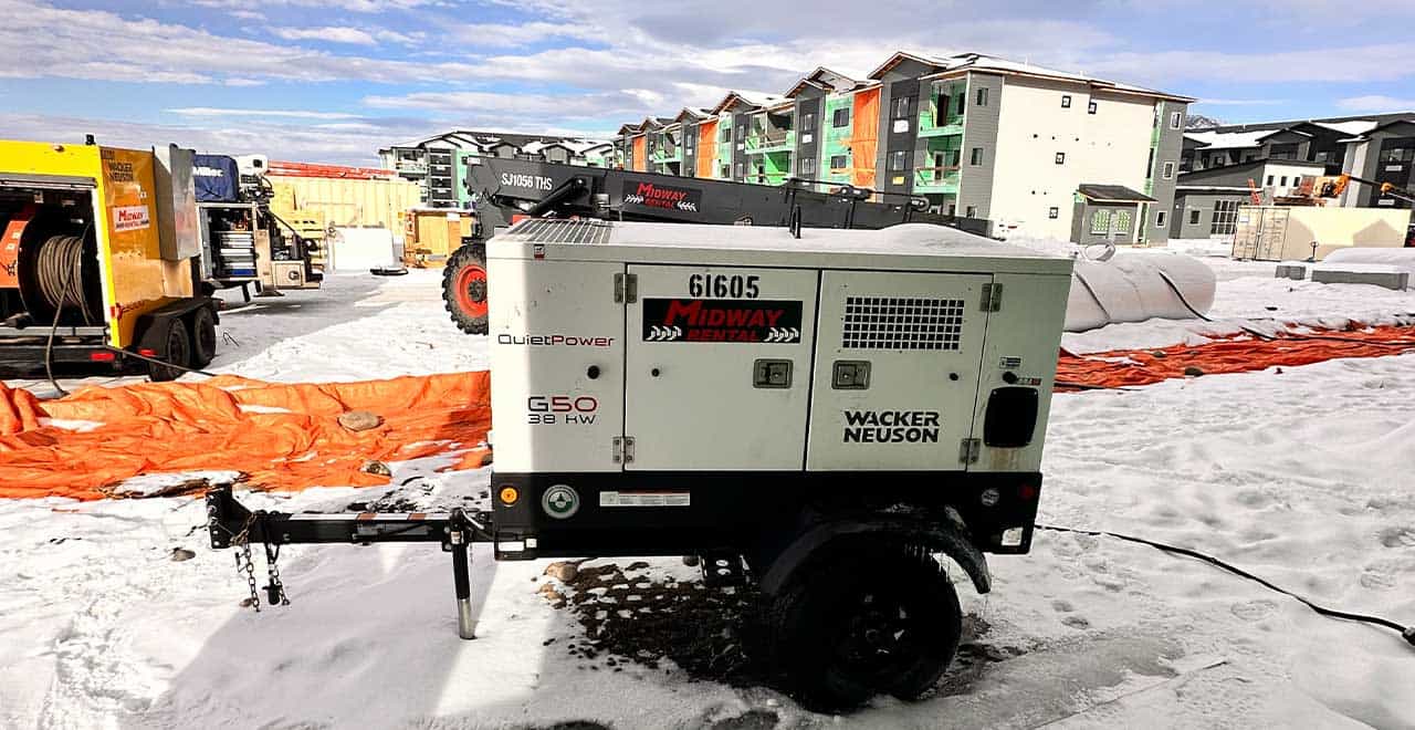 Portable generator providing reliable power in remote oil field winter conditions.