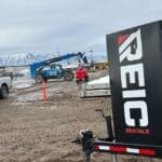 REIC Rentals equipment trailer at remote site for environmental protection.