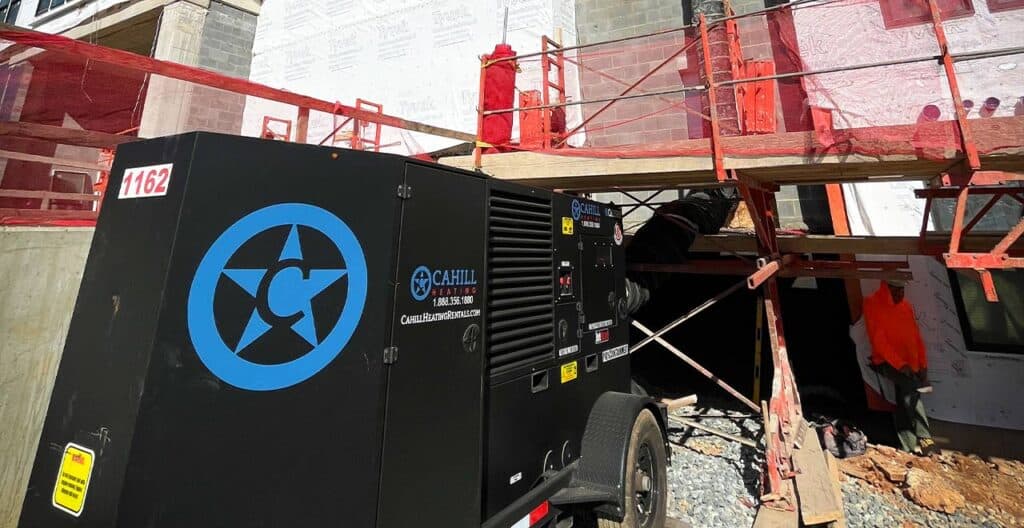 Portable industrial generator at a construction site for rental purposes.