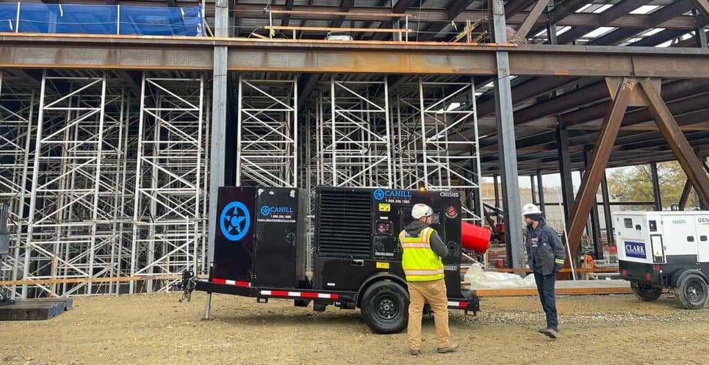 Construction site safety equipment with scaffolding and safety personnel.