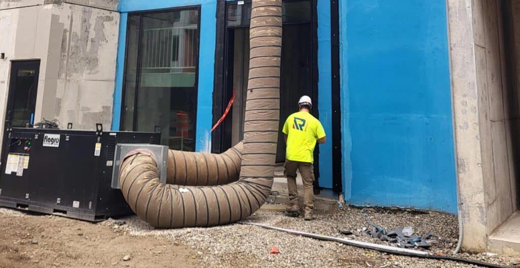 Large ventilation duct connected to climate control system at a facility.
