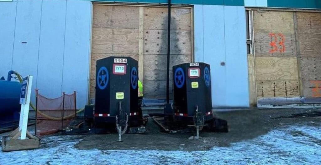 Portable toilets at a construction site for rental purposes.