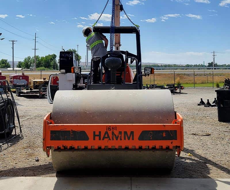 Road roller compactor at REIC Rentals for construction projects.
