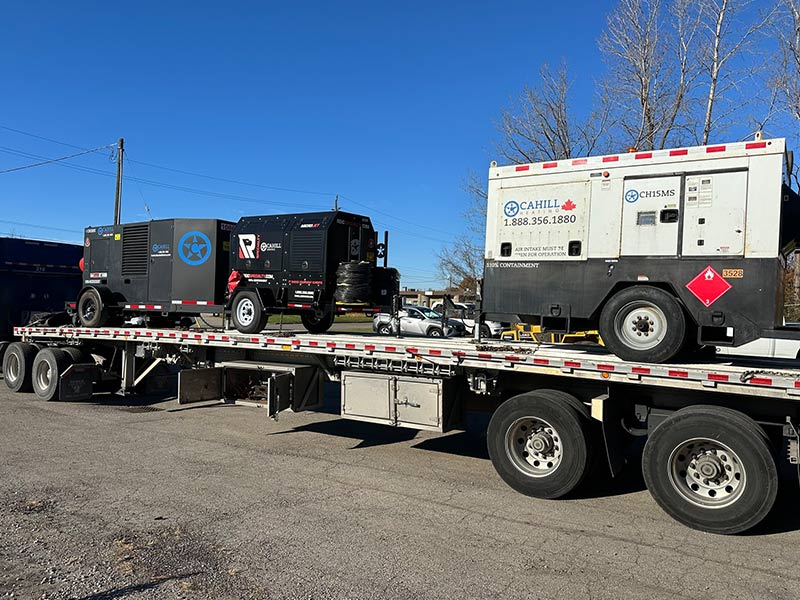 Portable generator and equipment on flatbed truck in Brantford, Ontario.