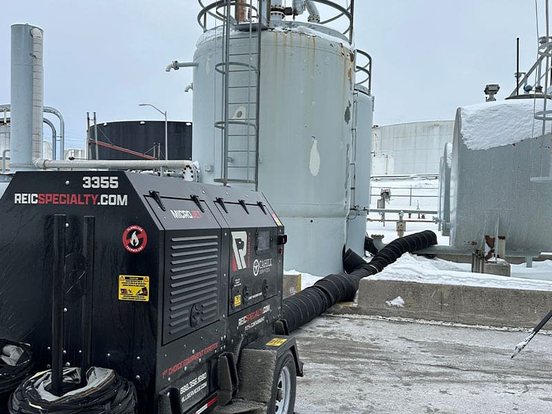 Heavy-duty generator and piping system at a commercial property.