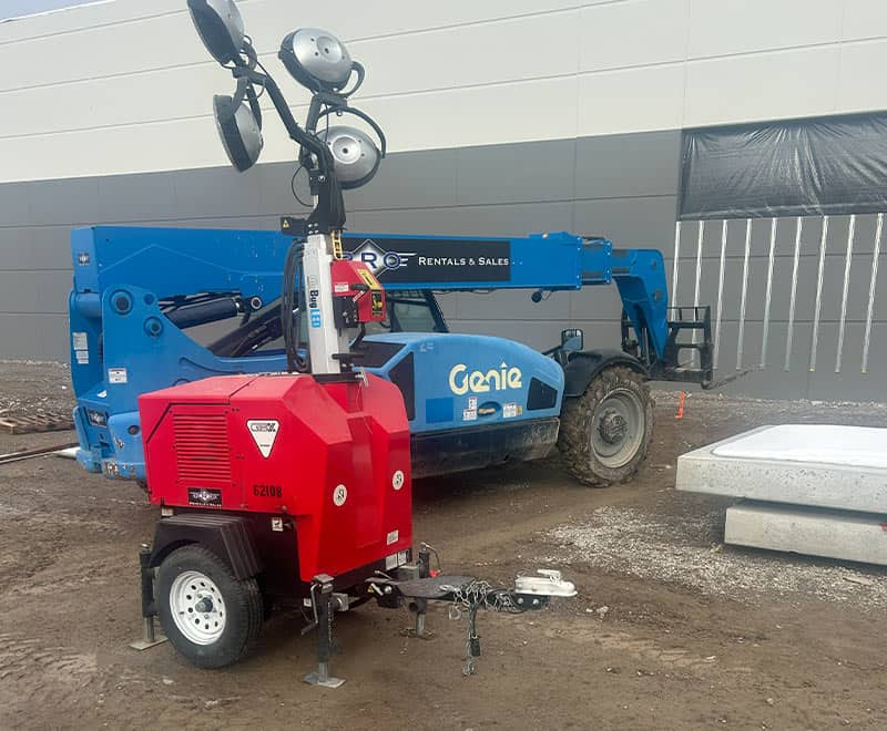 Mobile crane and lifting equipment at REIC Rentals site.
