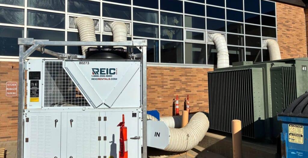 Industrial HVAC and electrical equipment at REIC Rentals site.