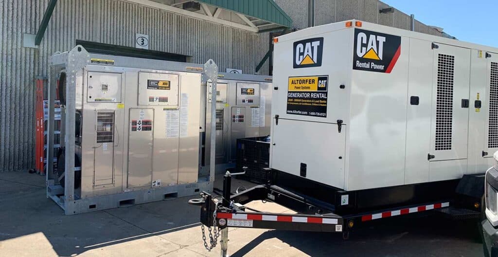 Portable power generator and electrical cabinets at a rental site.