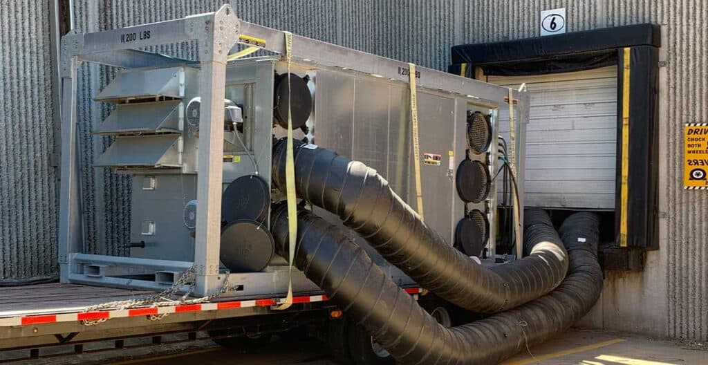 Industrial HVAC unit with ducting for rental at REIC Rentals.