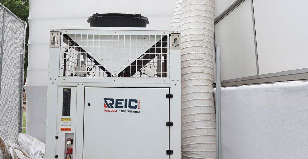 Commercial rental equipment unit at REIC with ventilation ducting.