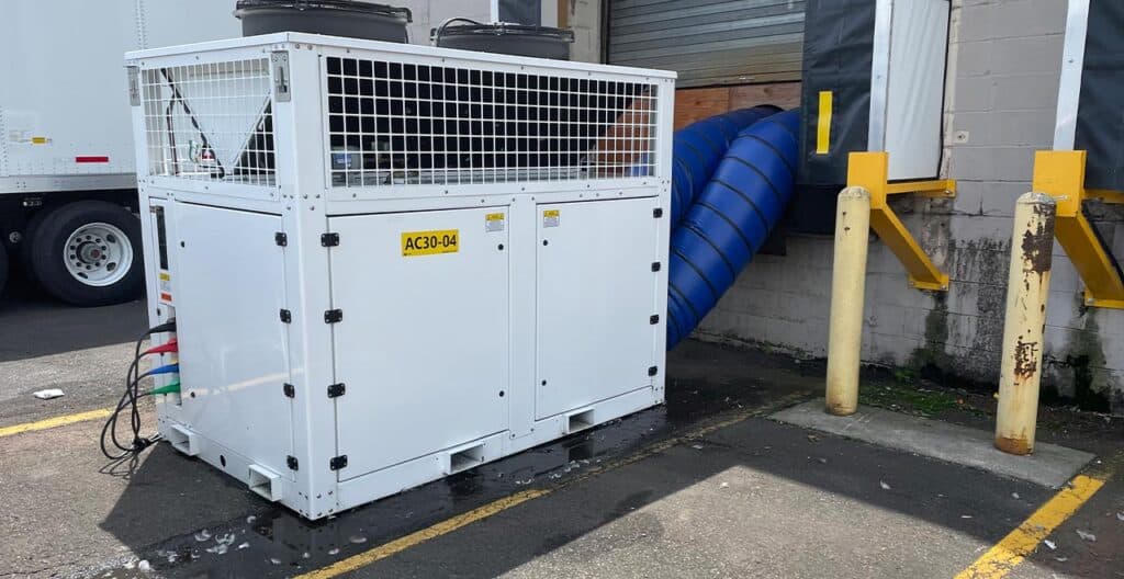 Secure industrial equipment storage container at REIC Rentals facility.