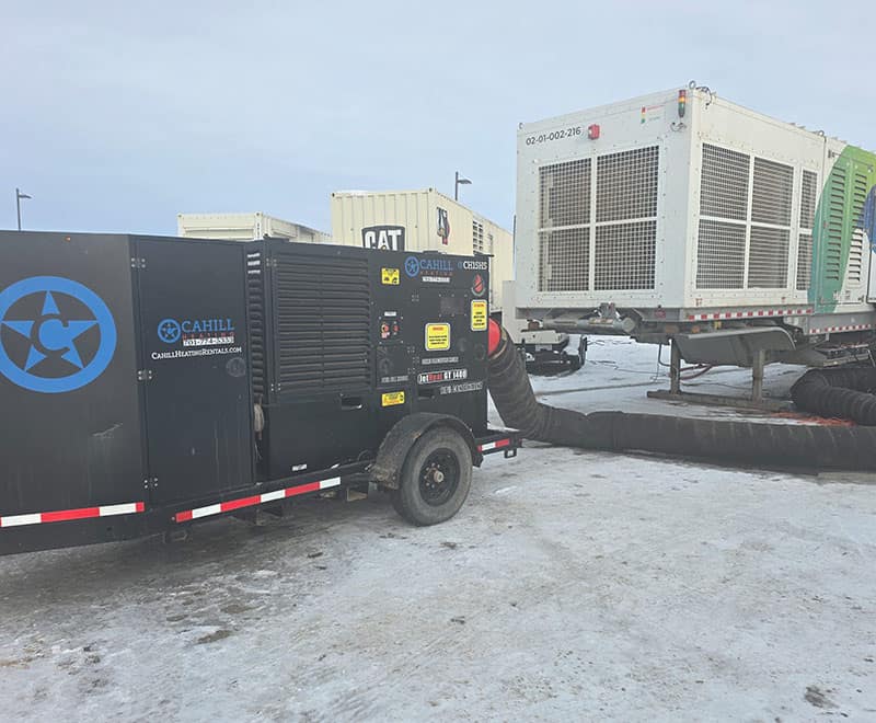 Construction equipment and generators at a rental site in Williston, North Dakota.