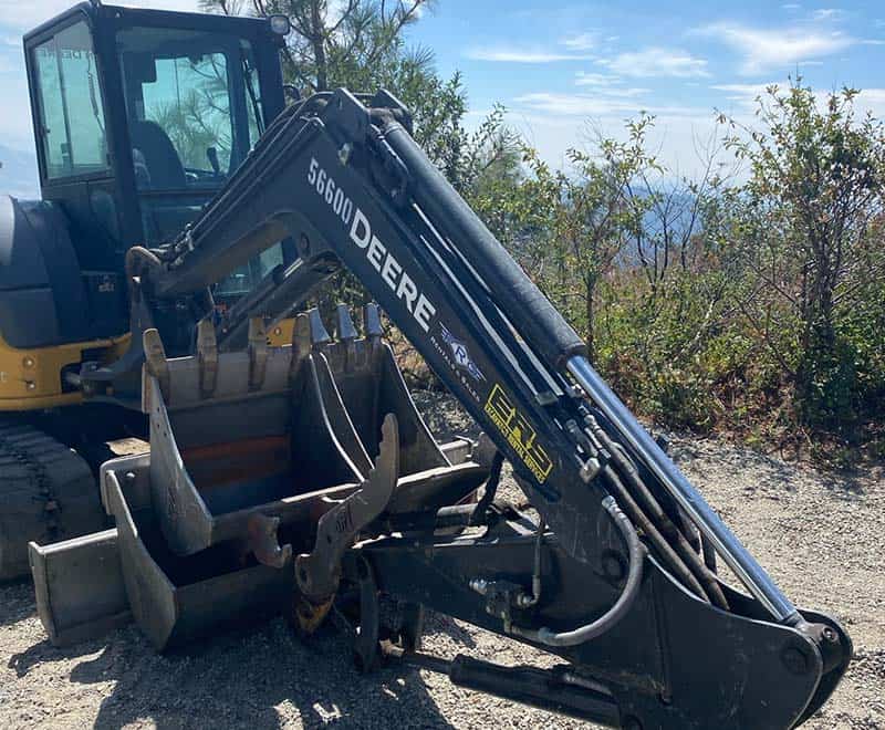 John Deere backhoe loader on a construction site in Yakima.